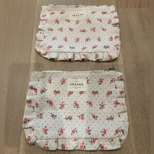 Sezane two floral beauty pouches